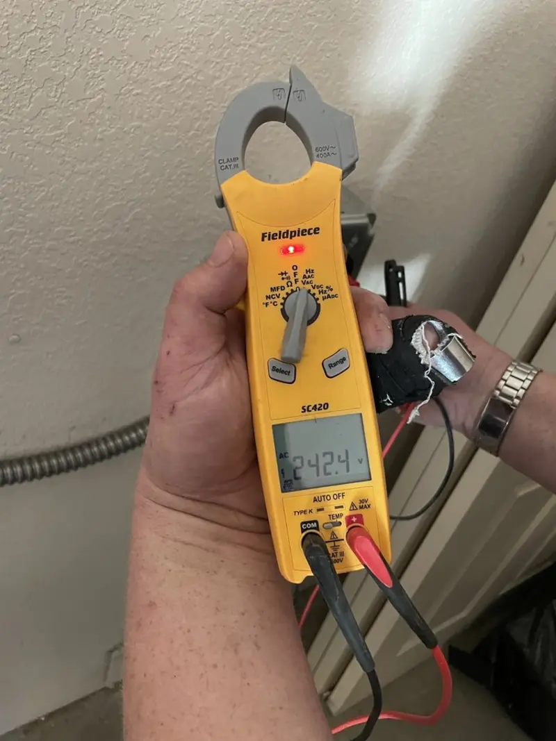 Voltage testing with clamp meter during Aluminum Wiring Replacement in Pearland